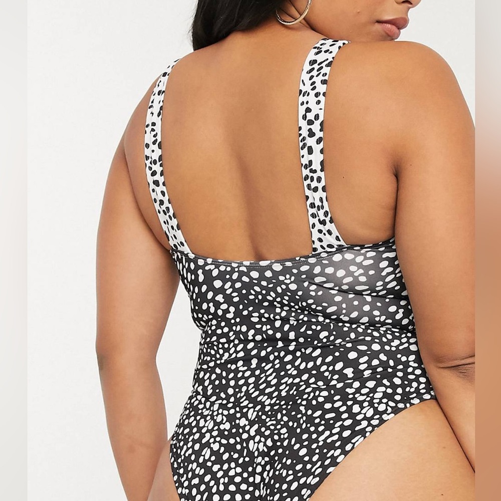 ASOS design. curve recycled v twist swimsuit.